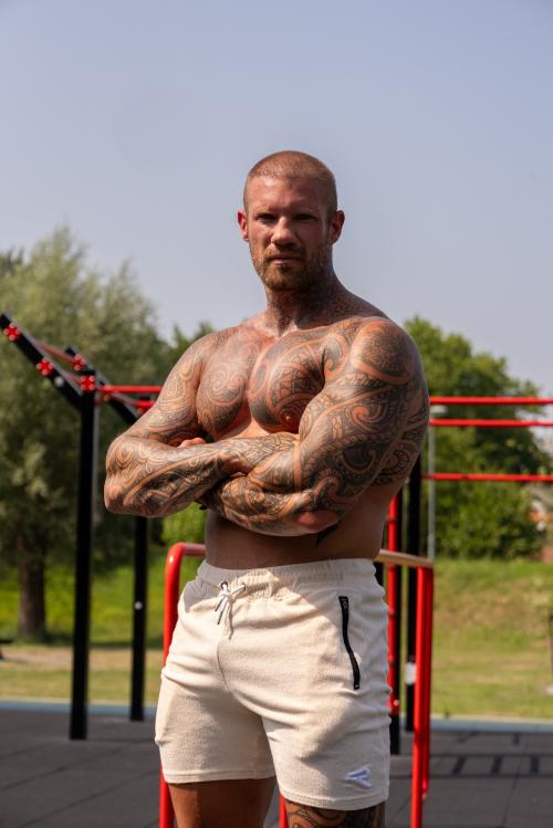 Top Tier Men fitness coach om mannen gelukkig te krijgen in hun routine